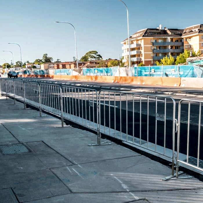 Crowd control barrier is set along the highway for traffic control.