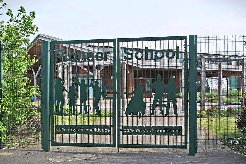 Double wire fence is installed round the school and used as the school gate.