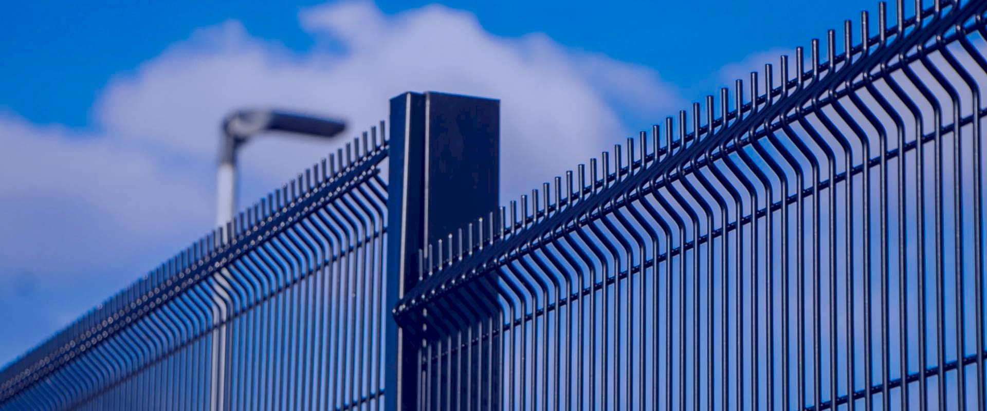 A piece of 358 high security fences under the blue sky.